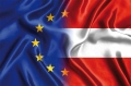 Symbolbild EU- und österreichische Flagge